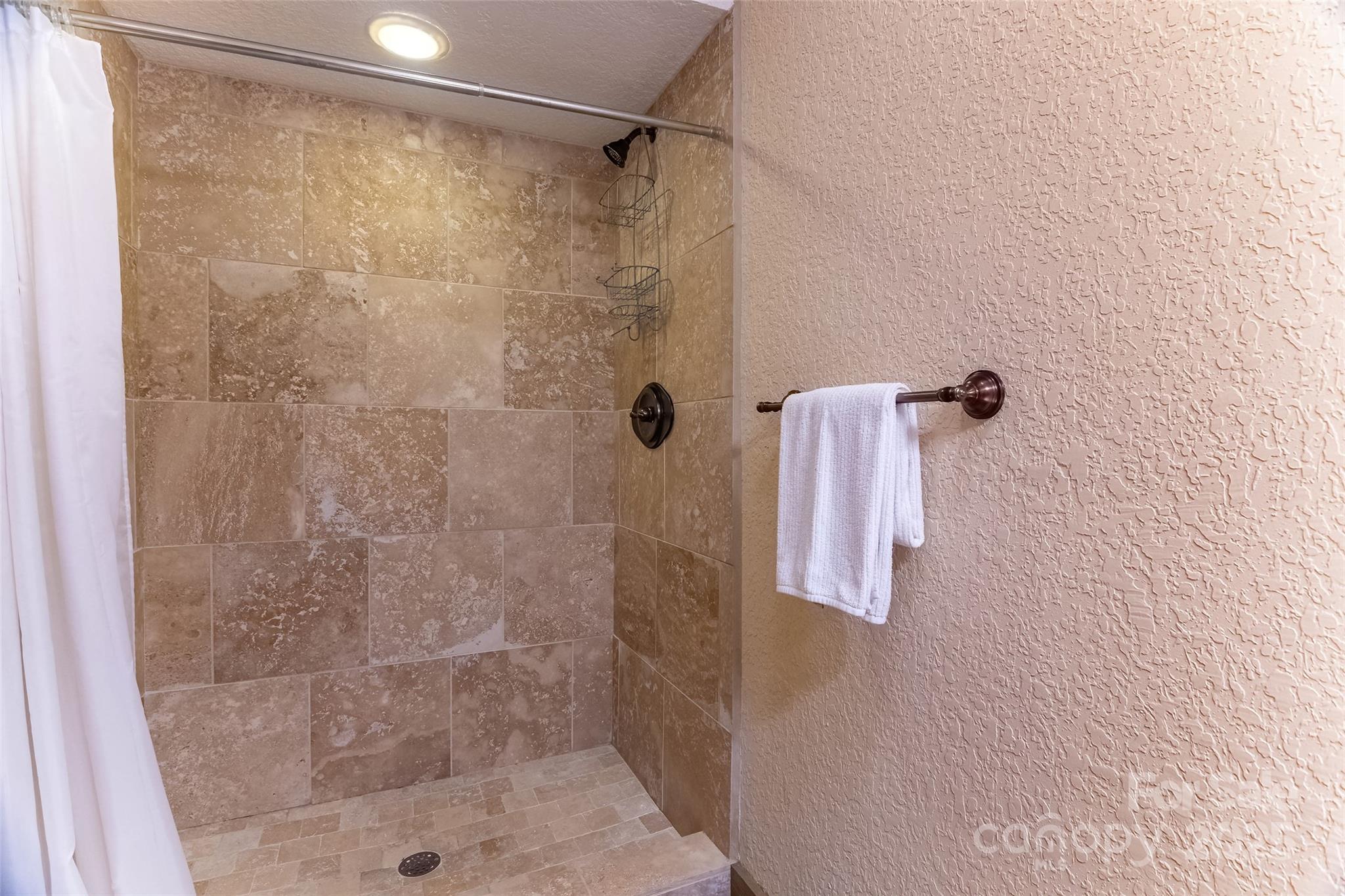 620 Sapphire Valley Road Sapphire, NC 28774 - Photo 31 of 48 a bathroom with a shower