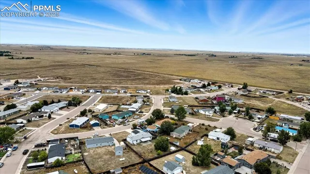 an aerial view of beach and ocean