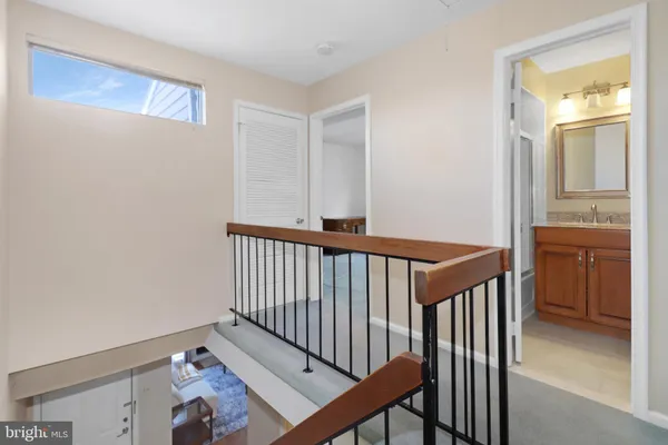 a view of a hallway with workspace