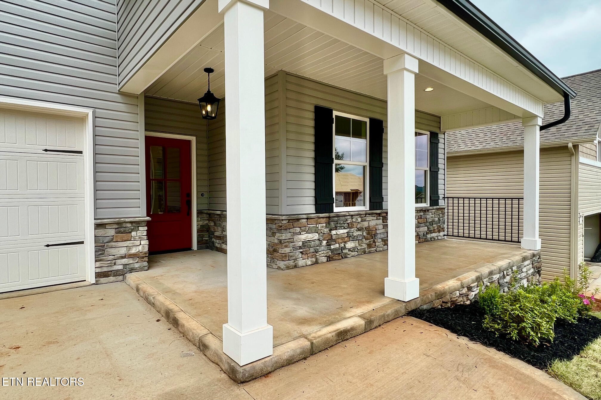 1209 Madison Oaks Road Knoxville, TN 37924 - Photo 2 of 35 a view of a house with a outdoor space