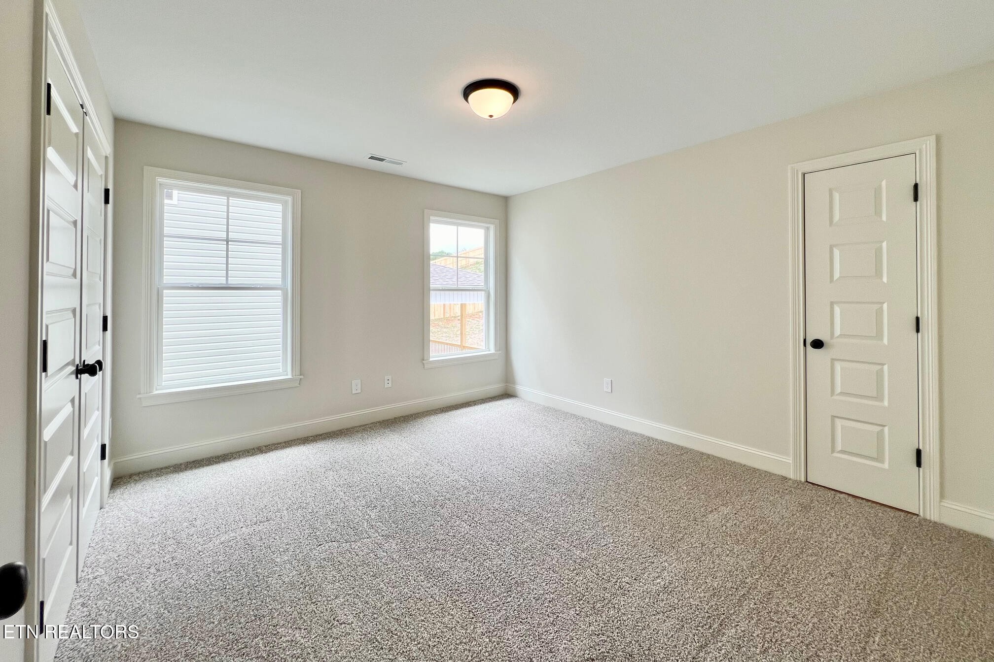1209 Madison Oaks Road Knoxville, TN 37924 - Photo 30 of 35 a view of an empty room with a window