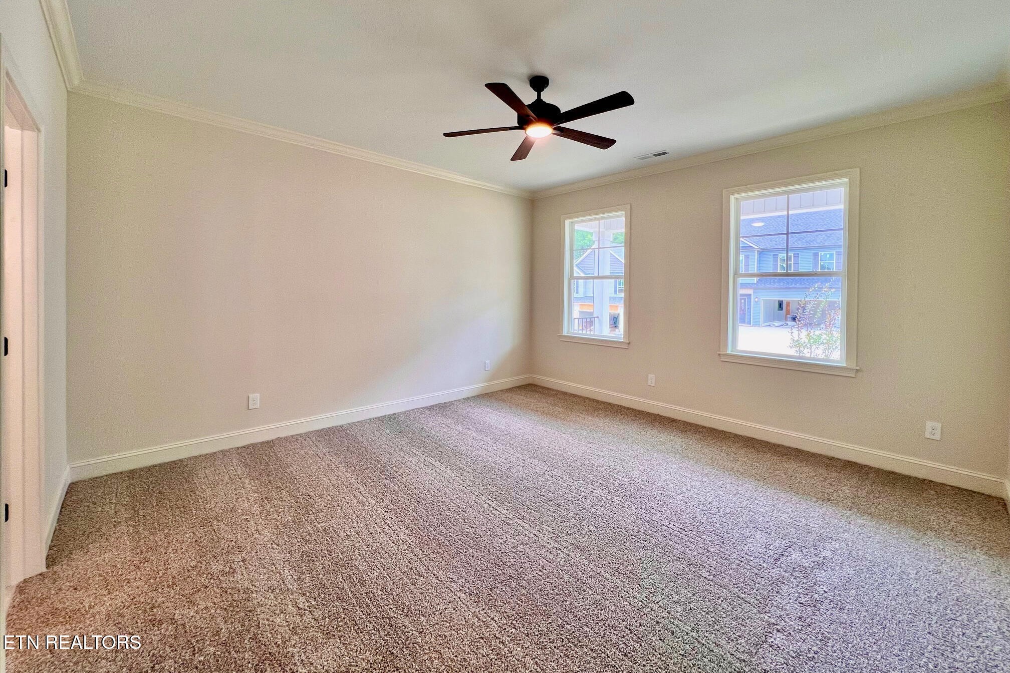 1209 Madison Oaks Road Knoxville, TN 37924 - Photo 5 of 35 a view of an empty room with a window