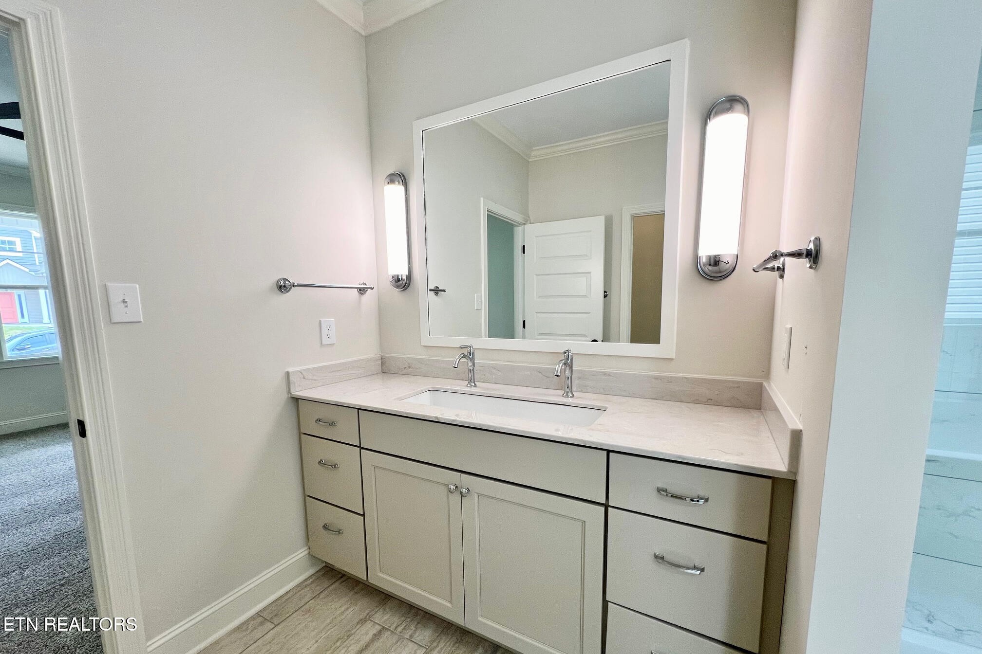 1209 Madison Oaks Road Knoxville, TN 37924 - Photo 7 of 35 a bathroom with a granite countertop sink and a mirror