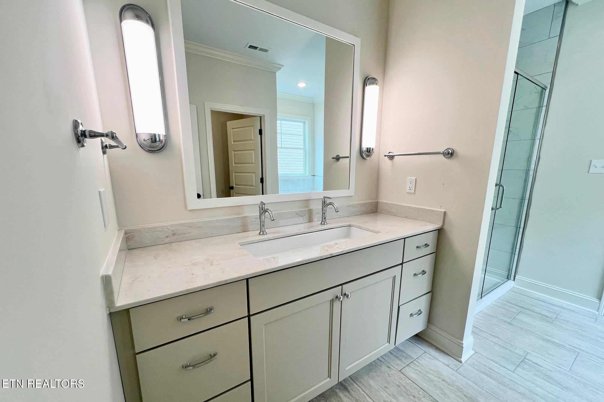 1209 Madison Oaks Road Knoxville, TN 37924 - Photo 8 of 35 a bathroom with a granite countertop sink and a mirror