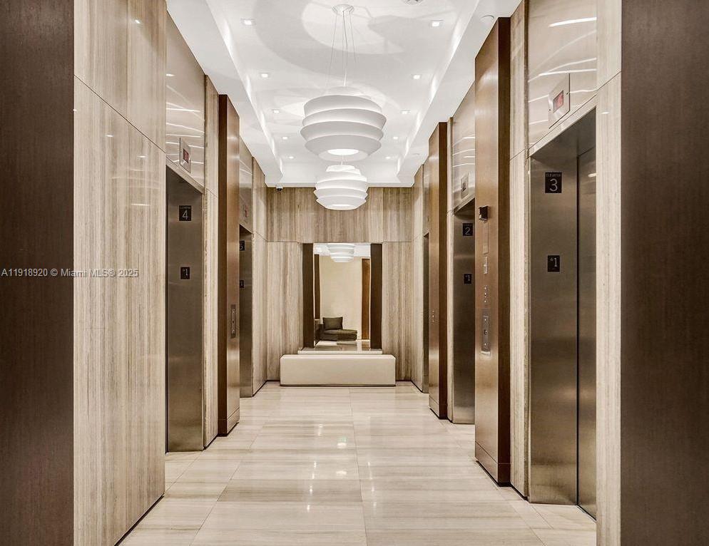 1330 West Avenue, Unit 2513 Miami Beach, FL 33139 - Photo 17 of 20 a view of a hallway with a furniture