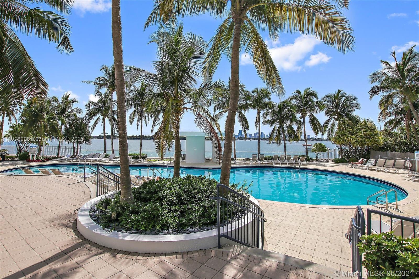 1330 West Avenue, Unit 2513 Miami Beach, FL 33139 - Photo 20 of 20 a view of a swimming pool with a patio and a swimming pool