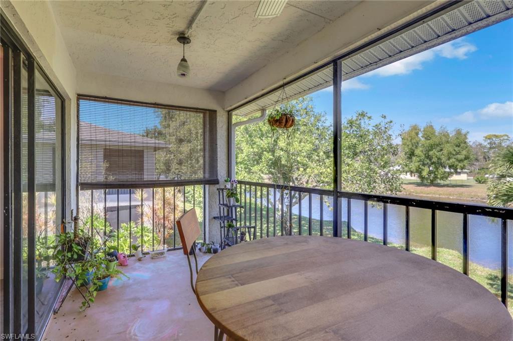 1211 Commonwealth Circle, Unit C201 Naples, FL 34116 - Photo 15 of 23 a view of a porch