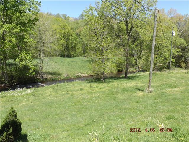 323 Spring Creek Road Lawrenceburg, TN 38464 - Photo 13 of 13 a view of an outdoor space and a yard