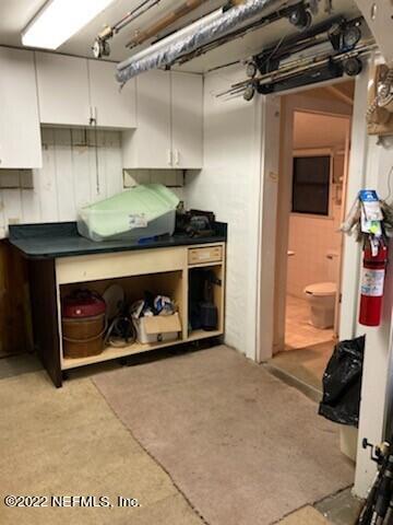 28 Jackson Road Atlantic Beach, FL 32233 - Photo 4 of 7 a stove top oven sitting inside of a kitchen