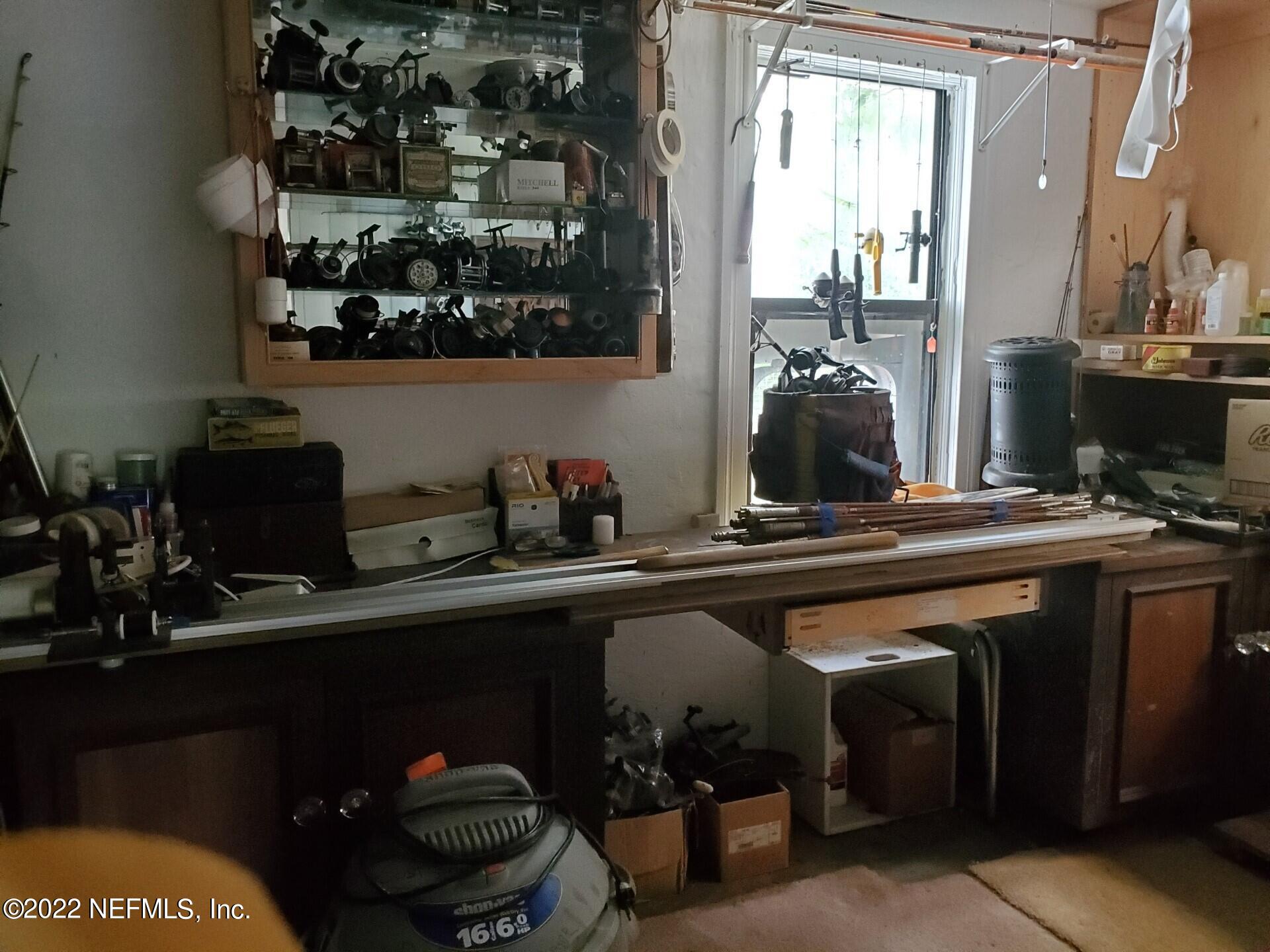 28 Jackson Road Atlantic Beach, FL 32233 - Photo 5 of 7 a kitchen with a sink and cabinets