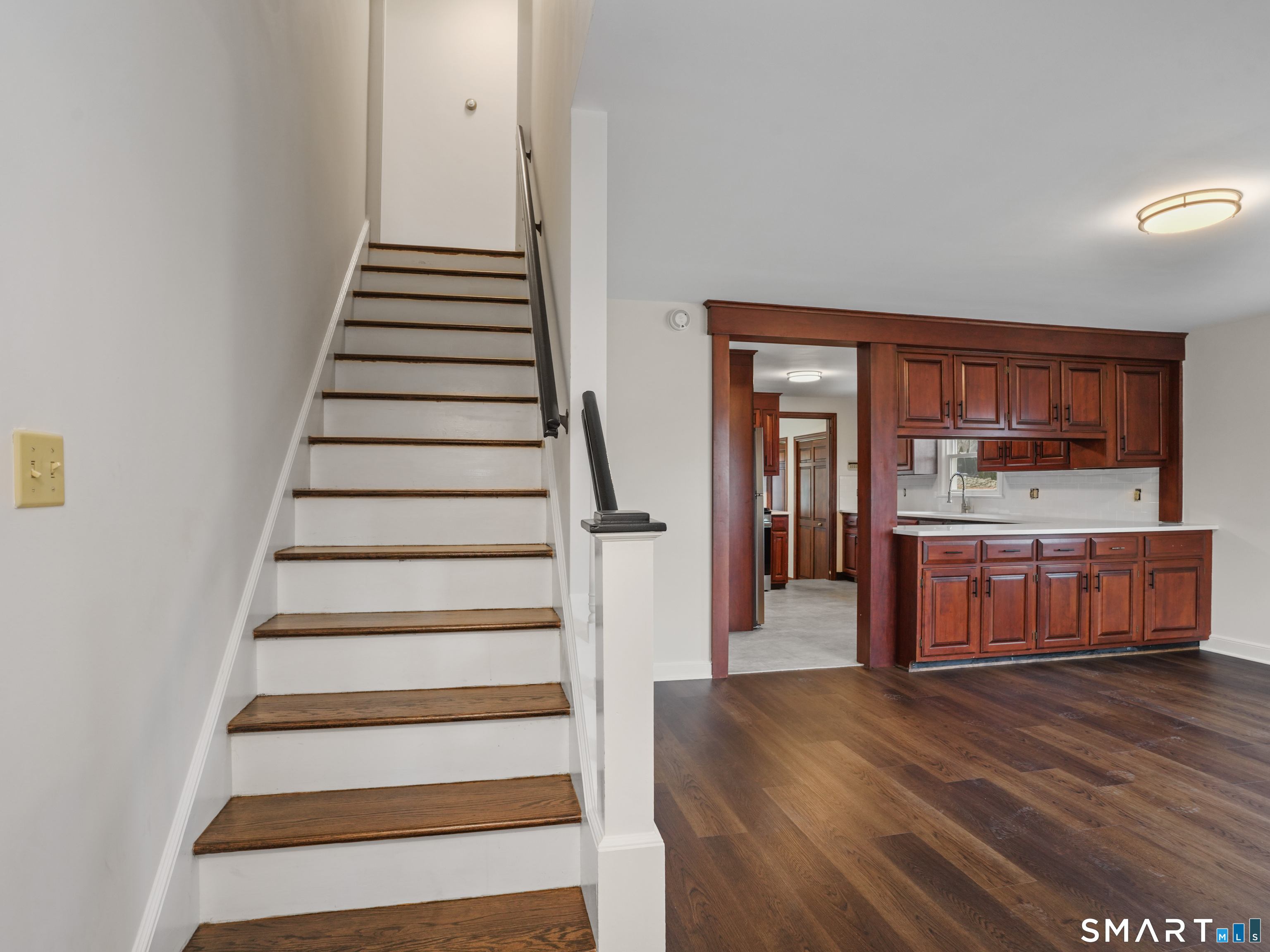 8 Raleigh Road Bridgeport, CT 06606 - Photo 4 of 20 a view of kitchen with sink and wooden floor