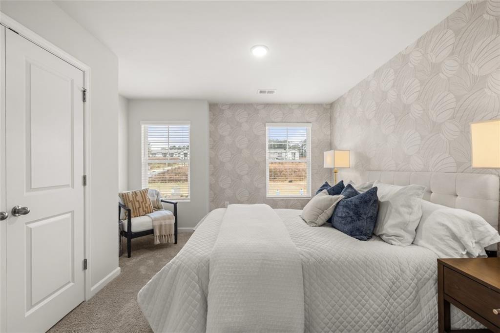 269 Epping Street, Unit 81 Stockbridge, GA 30281 - Photo 48 of 64 a bedroom with a bed and a window