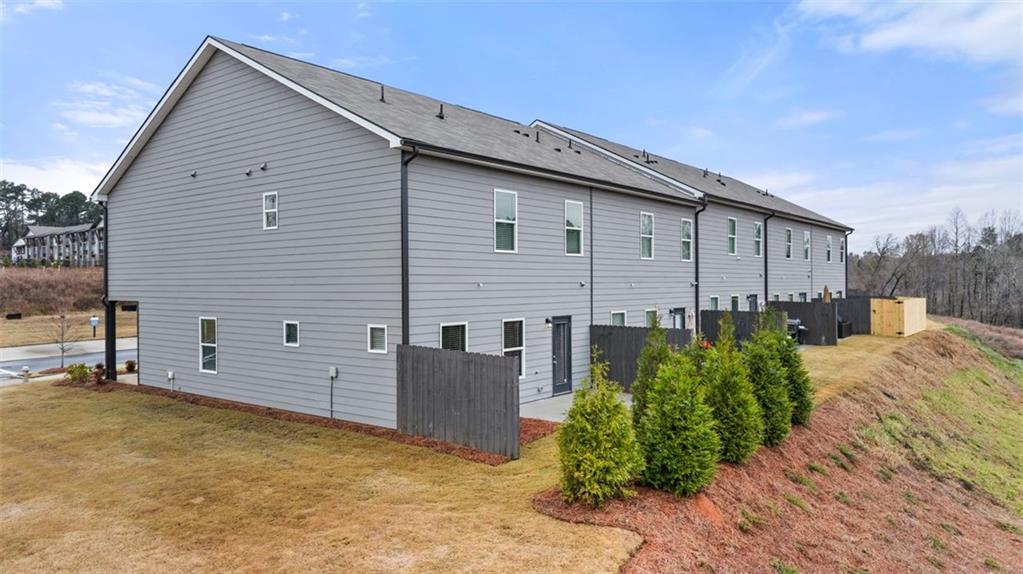 269 Epping Street, Unit 81 Stockbridge, GA 30281 - Photo 60 of 64 a view of a house with backyard