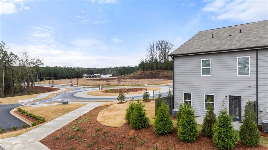 269 Epping Street, Unit 81 Stockbridge, GA 30281 - Photo 63 of 64 a view of a house with swimming pool and sitting area