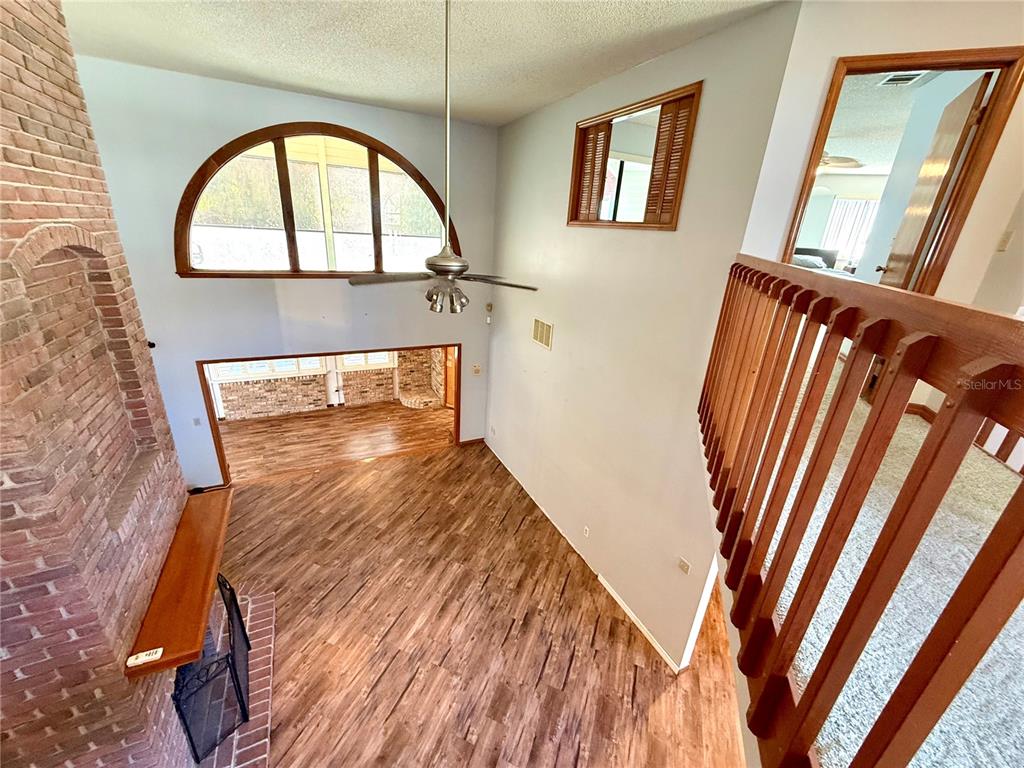 2395 Windward Cove Kissimmee, FL 34746 - Photo 23 of 62 a view of wooden floor in a house