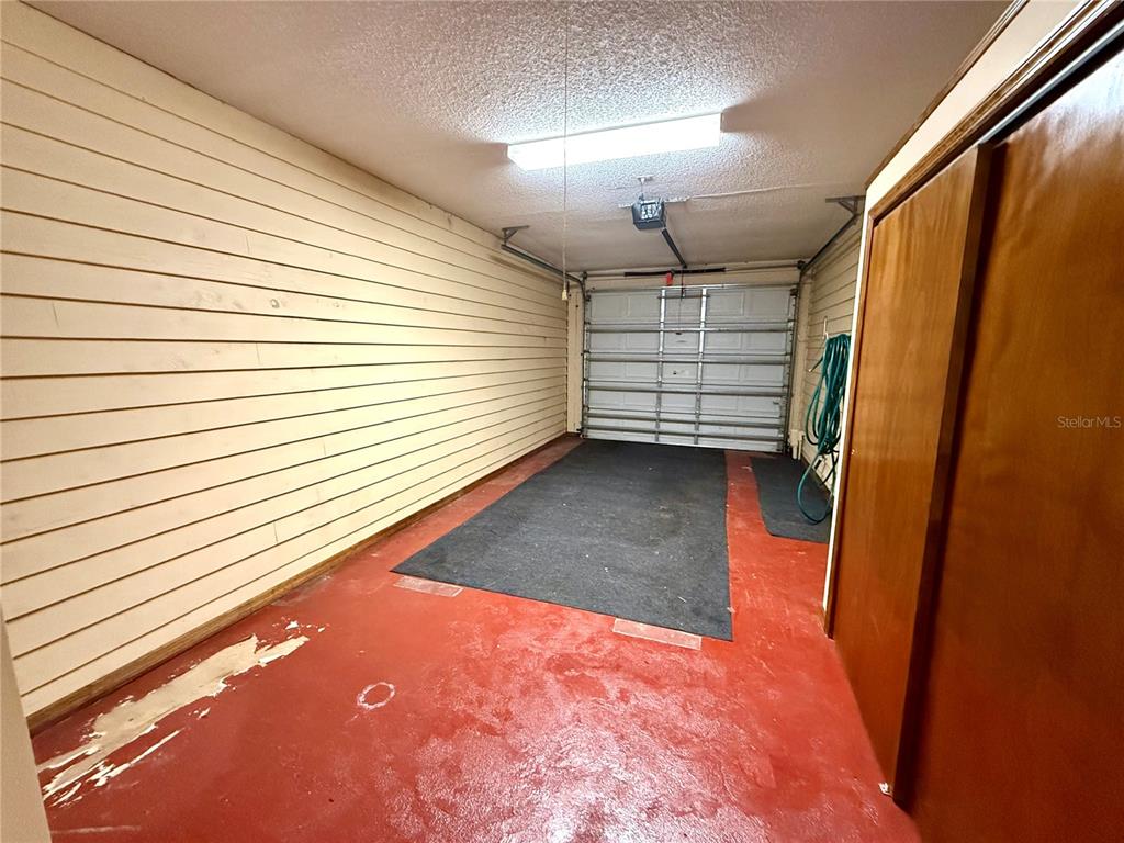 2395 Windward Cove Kissimmee, FL 34746 - Photo 47 of 62 a view of room with window and a ceiling fan