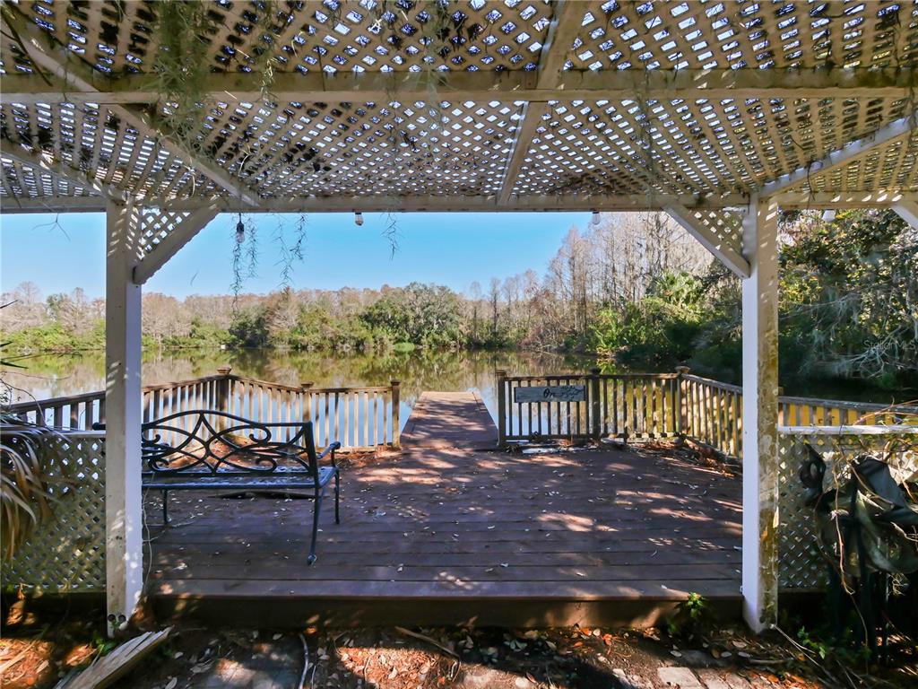 2395 Windward Cove Kissimmee, FL 34746 - Photo 52 of 62 a view of a chairs and table on the wooden floor