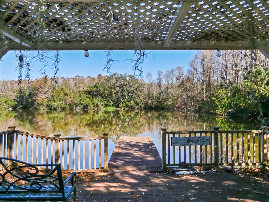 2395 Windward Cove Kissimmee, FL 34746 - Photo 53 of 62 a view of a balcony with wooden fence
