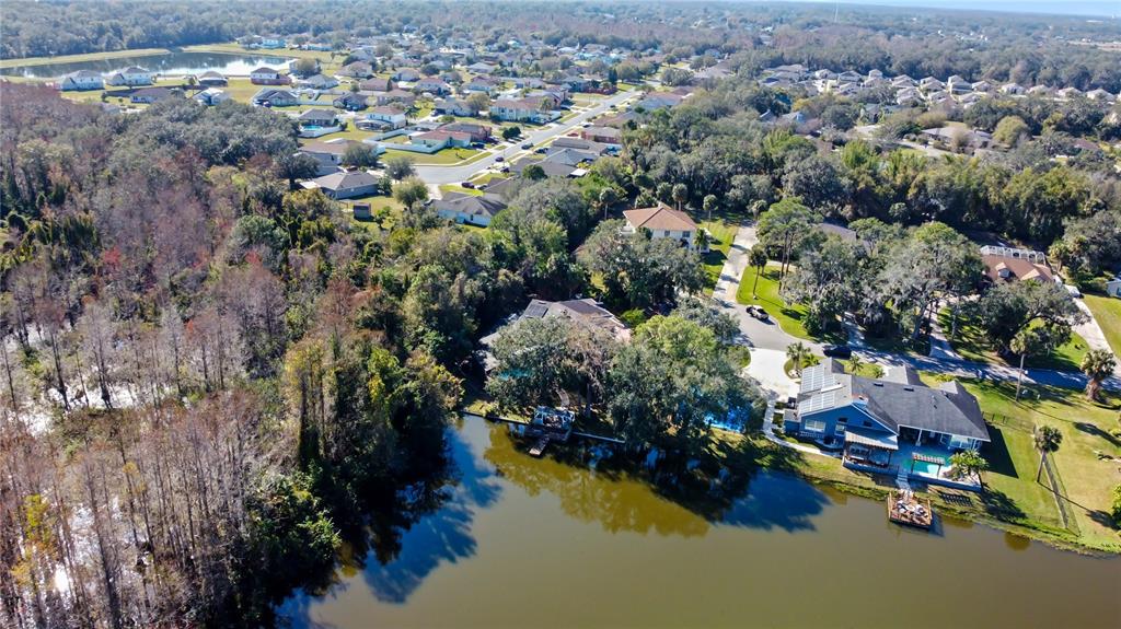 2395 Windward Cove Kissimmee, FL 34746 - Photo 61 of 62 an aerial view of residential houses with outdoor space and swimming pool