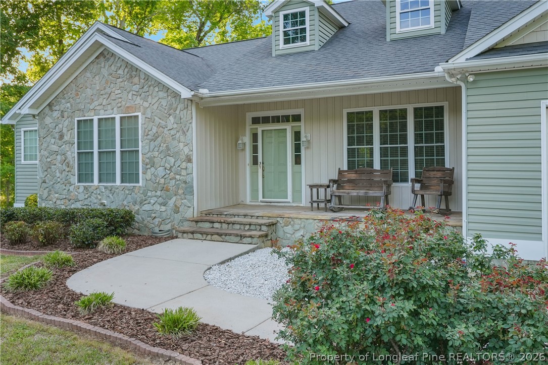 280 Hemp St Extension Robbins, NC 27325 - Photo 5 of 29 a front view of a house with sitting area