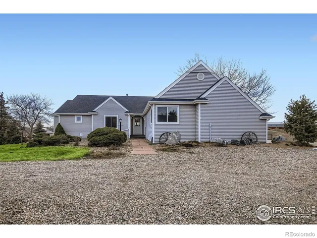 a house view with a garden space