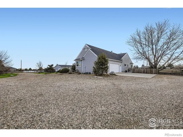 a view of large house with a yard