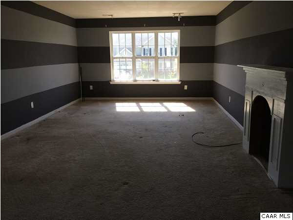 114 Apple Orchard Road Louisa, VA 23093 - Photo 2 of 8 a view of an empty room with a window
