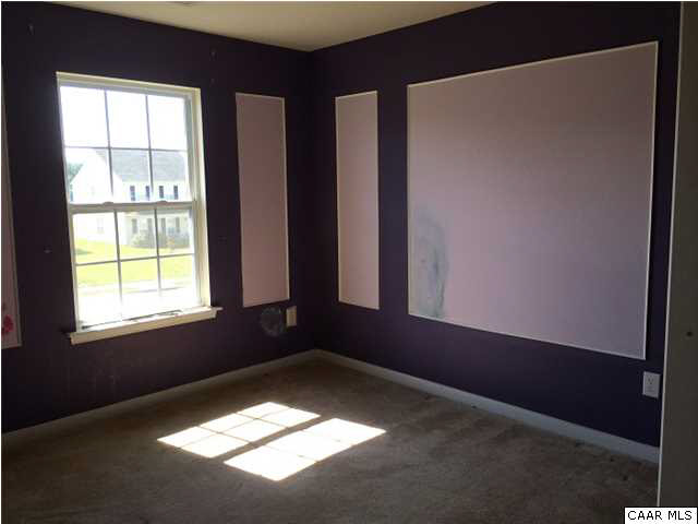 114 Apple Orchard Road Louisa, VA 23093 - Photo 3 of 8 an empty room with a window