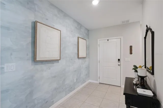 a view of a bathroom with mirror