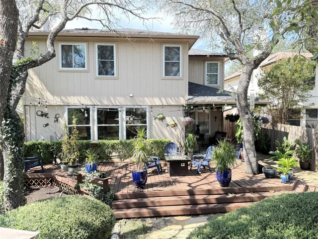 a view of a balcony with chairs