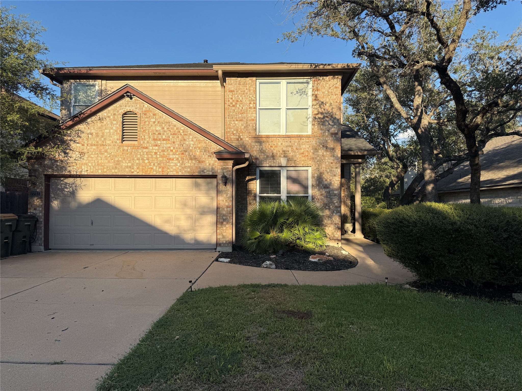 7712 Earp Way Austin, TX 78729 - Photo 5 of 40 a view of a backyard of the house