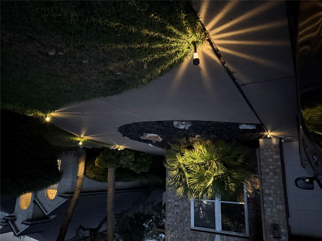 7712 Earp Way Austin, TX 78729 - Photo 6 of 40 a view of a backyard of the house