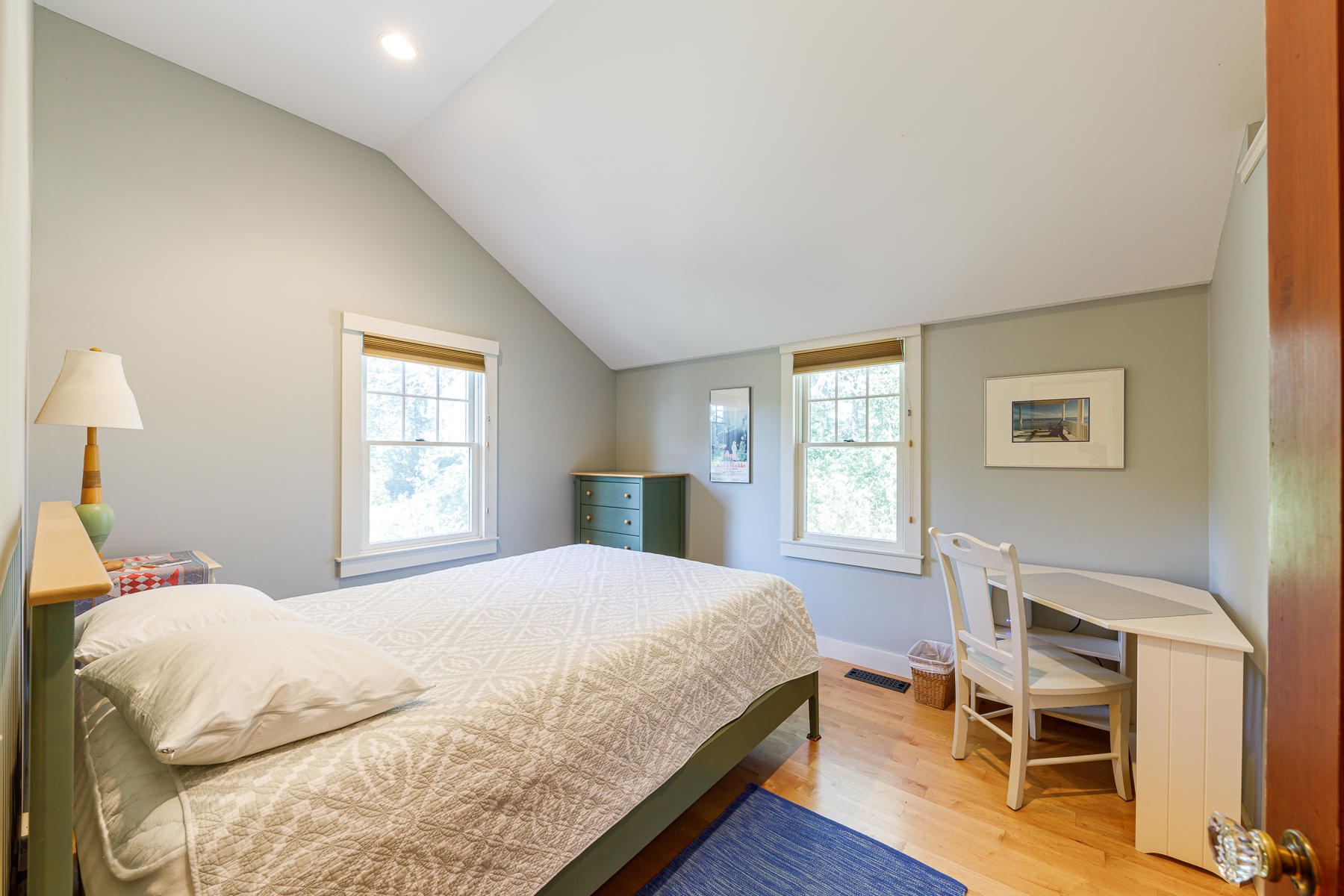 295 Mill Road Eastham, MA 02642 - Photo 28 of 33 a bedroom with a bed and a table in it with window