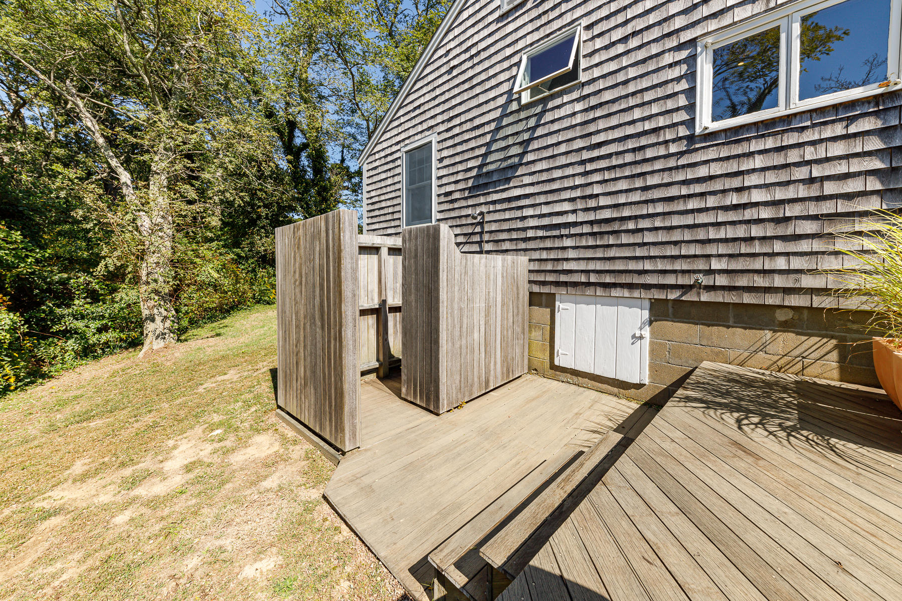 295 Mill Road Eastham, MA 02642 - Photo 30 of 33 a view of a backyard with sitting area
