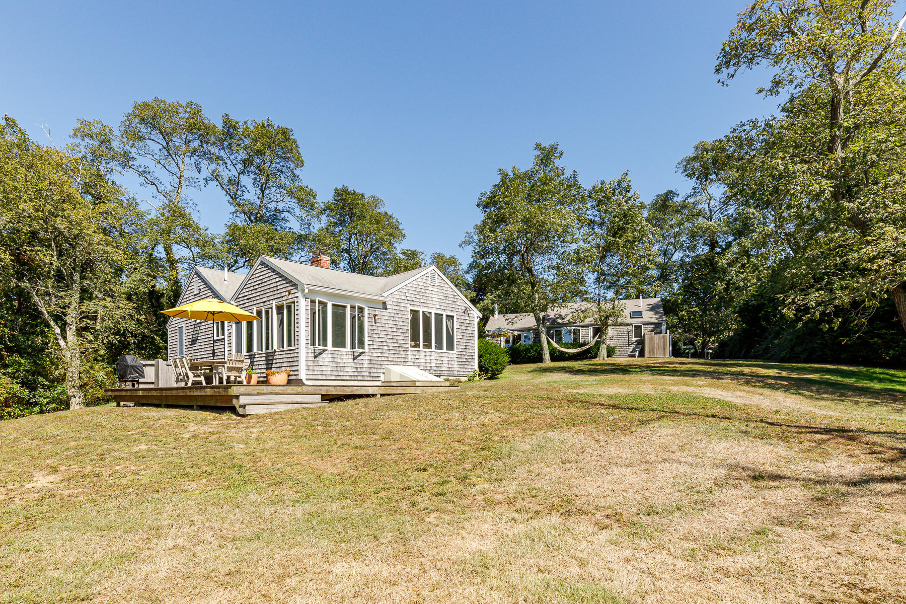 295 Mill Road Eastham, MA 02642 - Photo 32 of 33 a front view of a house with a yard
