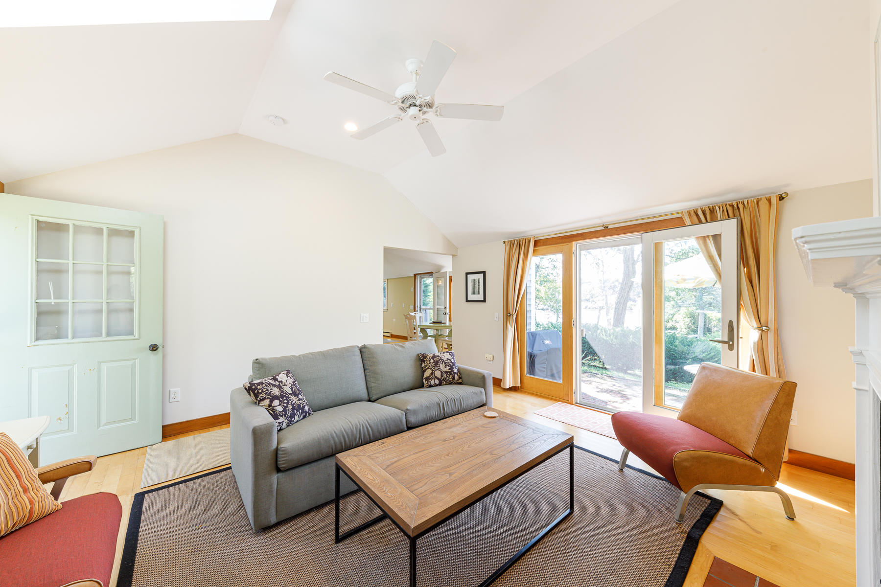295 Mill Road Eastham, MA 02642 - Photo 8 of 33 a living room with furniture and a large window