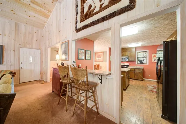a view of a living room and dining room