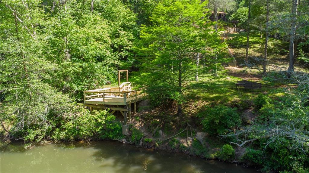 400 Matrix Circle Ellijay, GA 30540 - Photo 2 of 47 a backyard of a house with a table and chairs