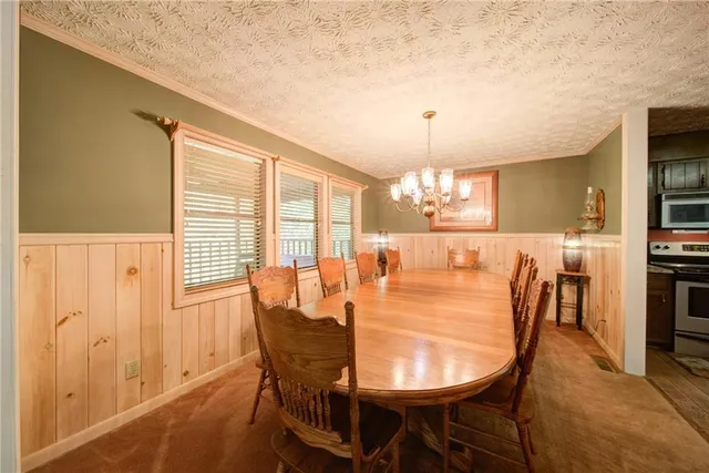 a view of a bathroom with a sink and a mirror