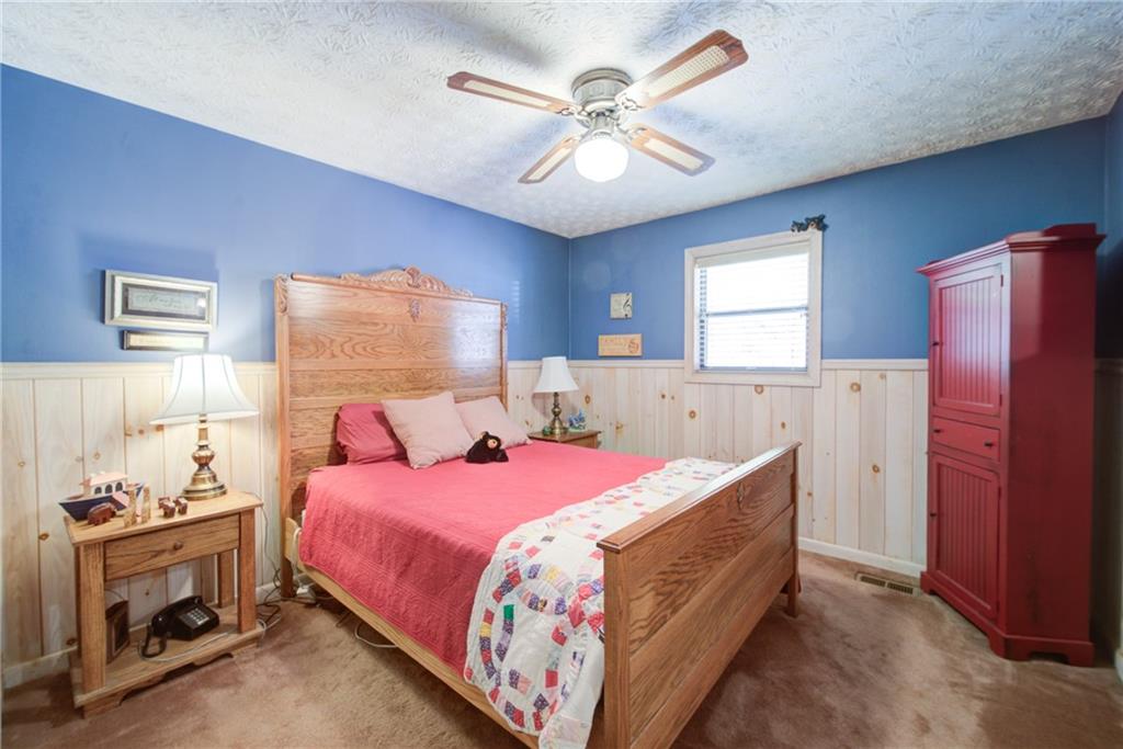 400 Matrix Circle Ellijay, GA 30540 - Photo 25 of 47 a bed room with a bed and a window