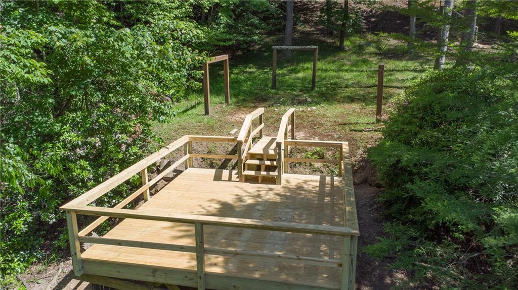 400 Matrix Circle Ellijay, GA 30540 - Photo 3 of 47 a view of a balcony with chairs