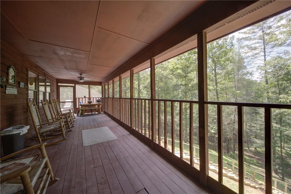 400 Matrix Circle Ellijay, GA 30540 - Photo 38 of 47 a view of a balcony with chairs