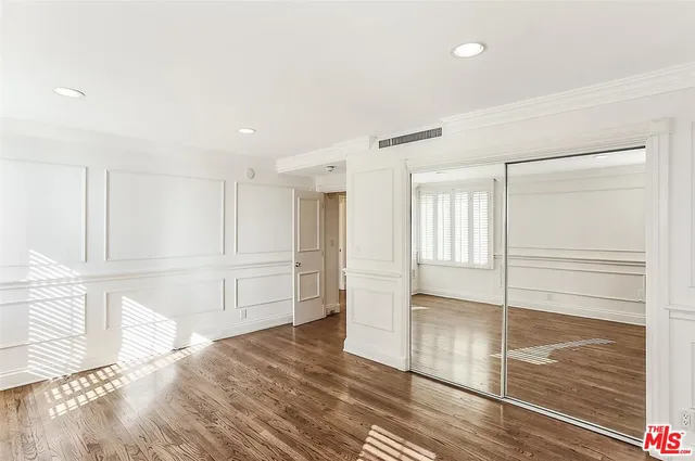 a view of a room with a window