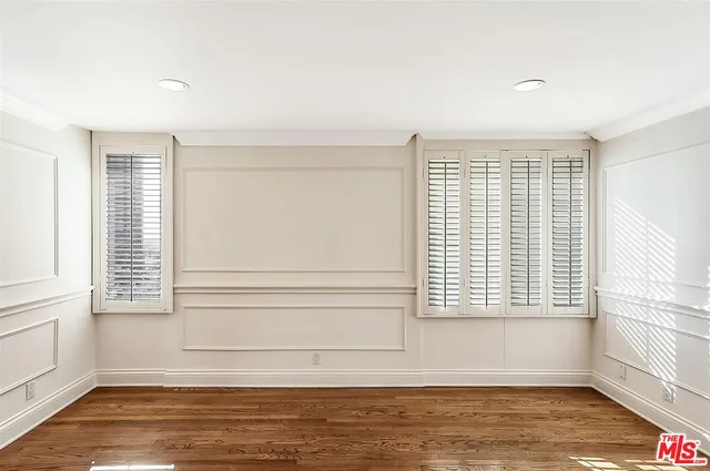 a view of a room with a large window