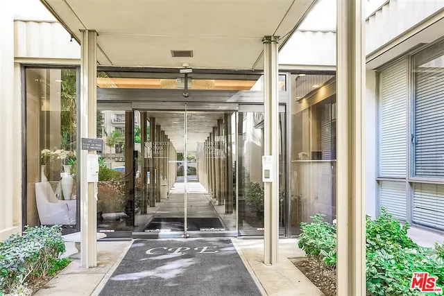 a view of porch with a glass door and glass door
