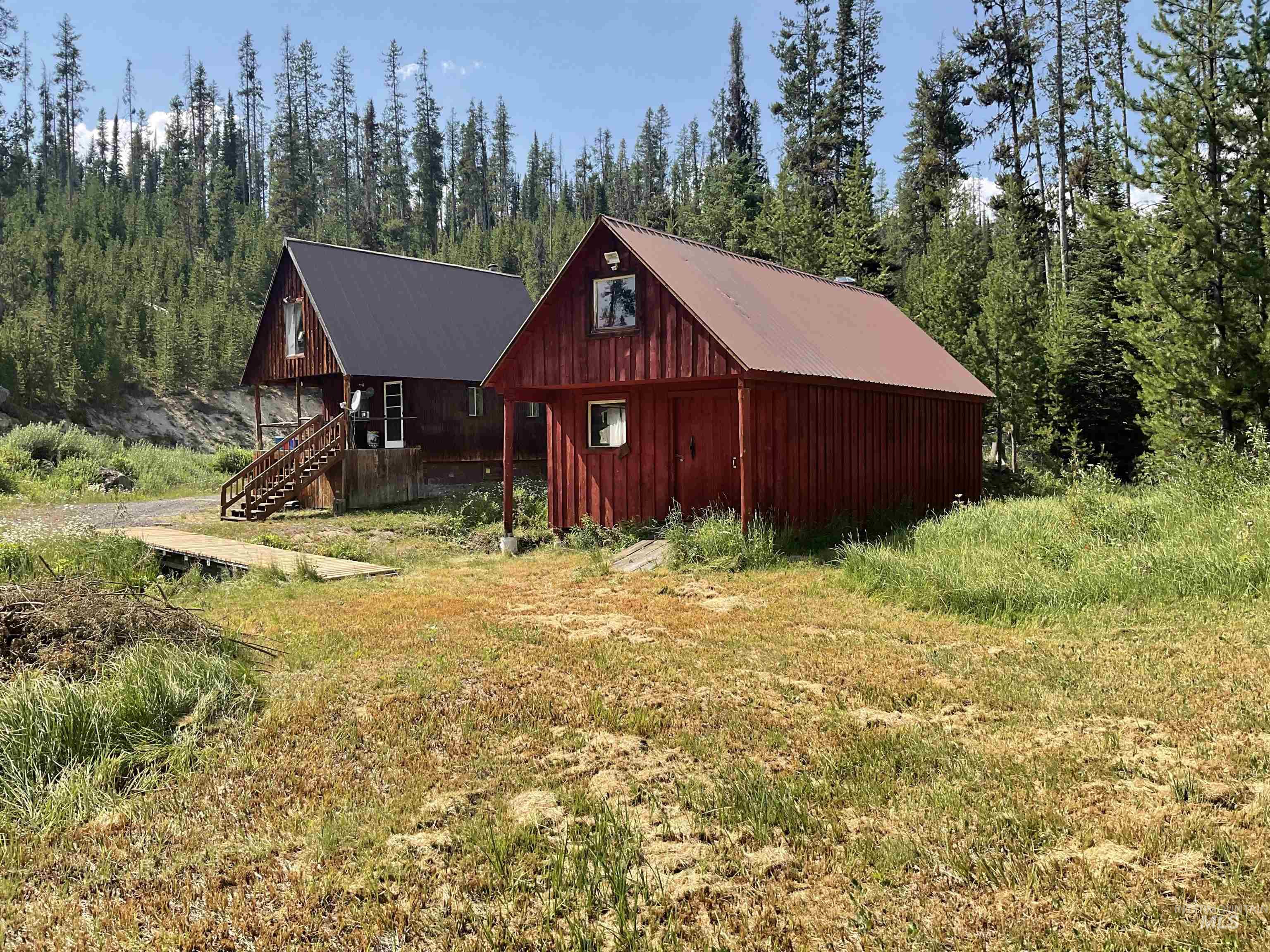2871 Orogrande-Dixie Road Elk City, ID 83525 - Photo 11 of 40 Two structures featuring wood siding and metal roofing