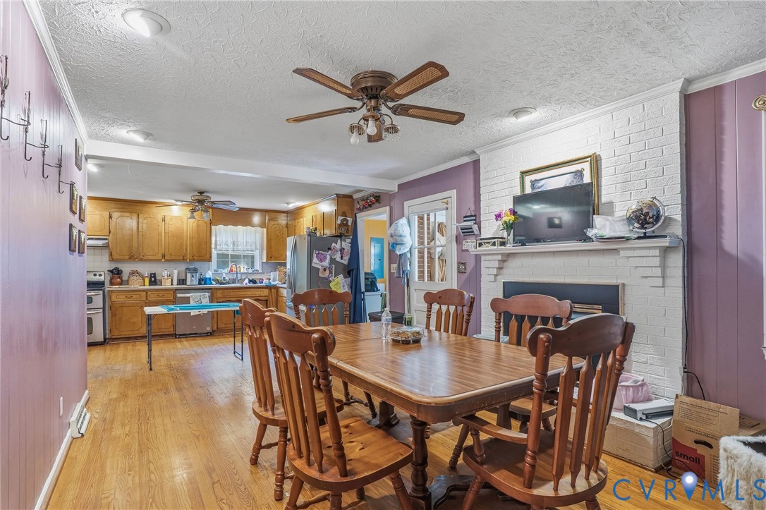 14219 Spruce Avenue Chester, VA 23836 - Photo 14 of 32 a dining room with furniture and window
