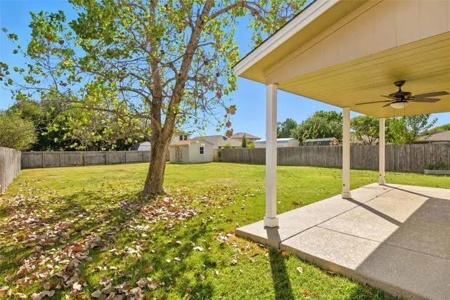 a view of a backyard with a garden