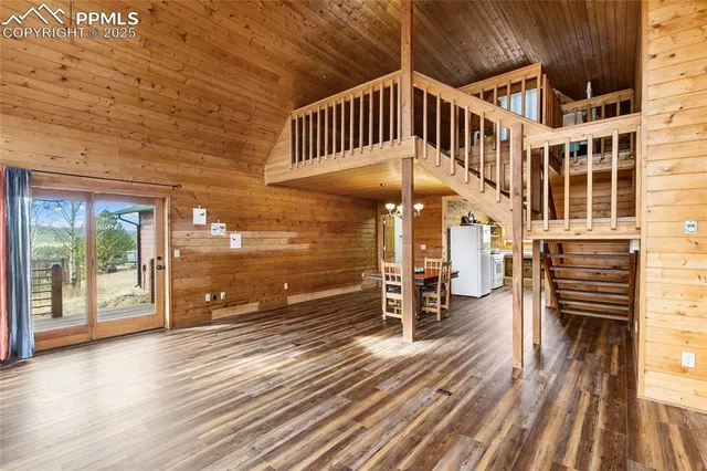 swimming pool view with a seating space