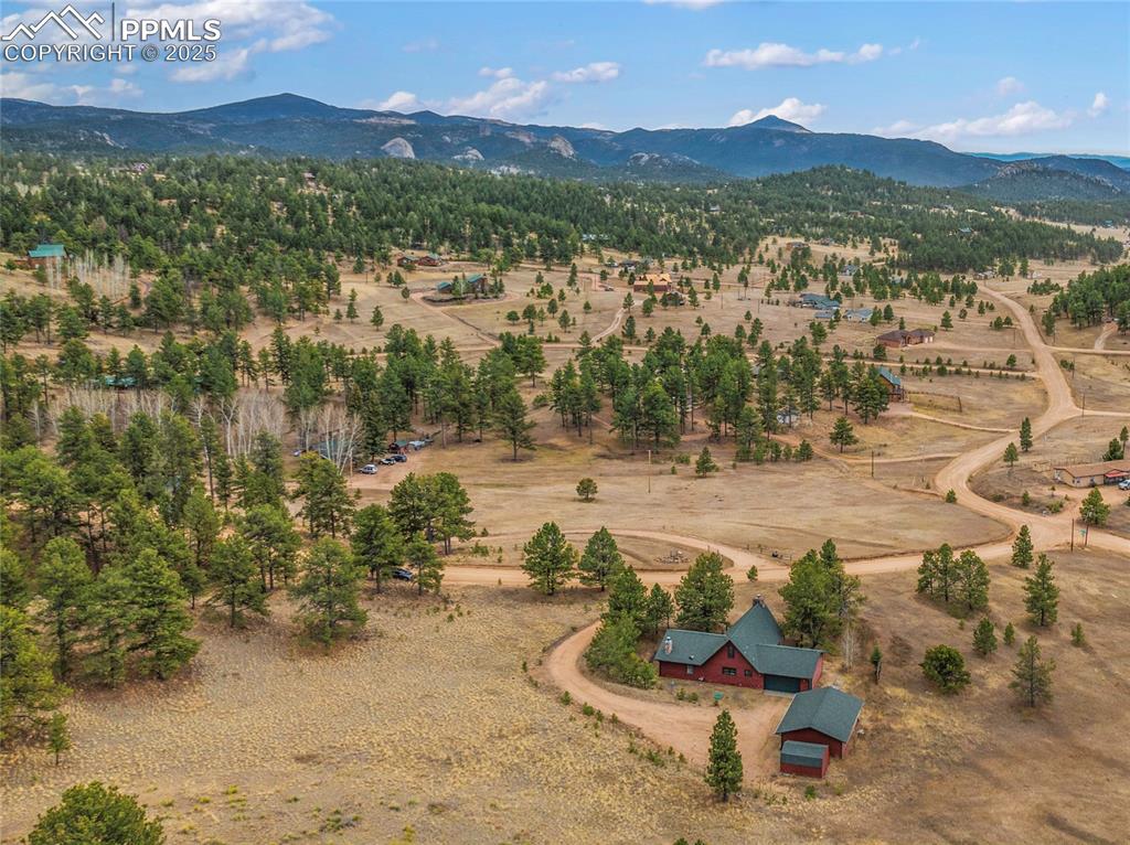 795 South Mountain Estates Road Florissant, CO 80816 - Photo 2 of 42 a view of lake with mountain view